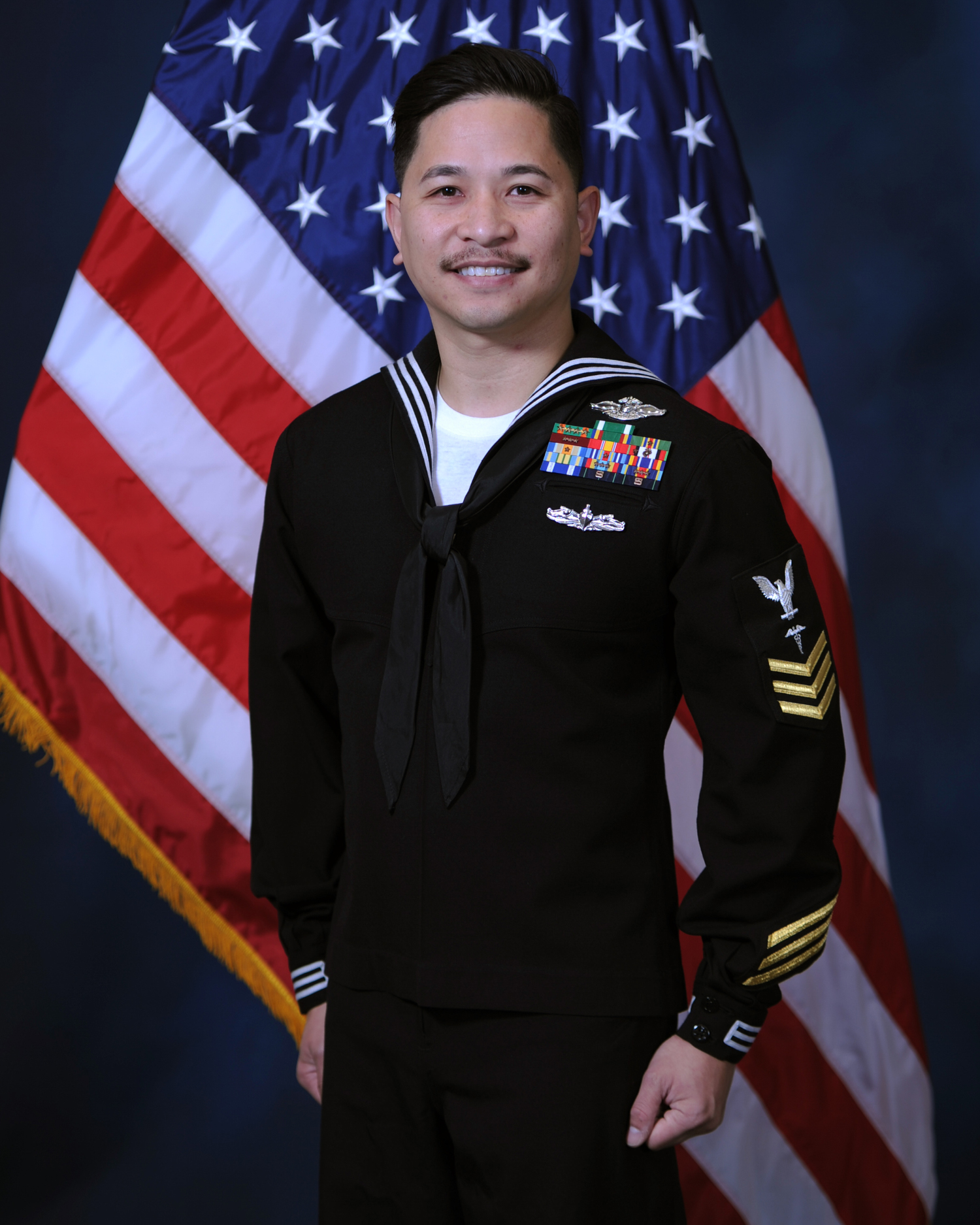 Petty Officer 1st Class Henson A. Chiong